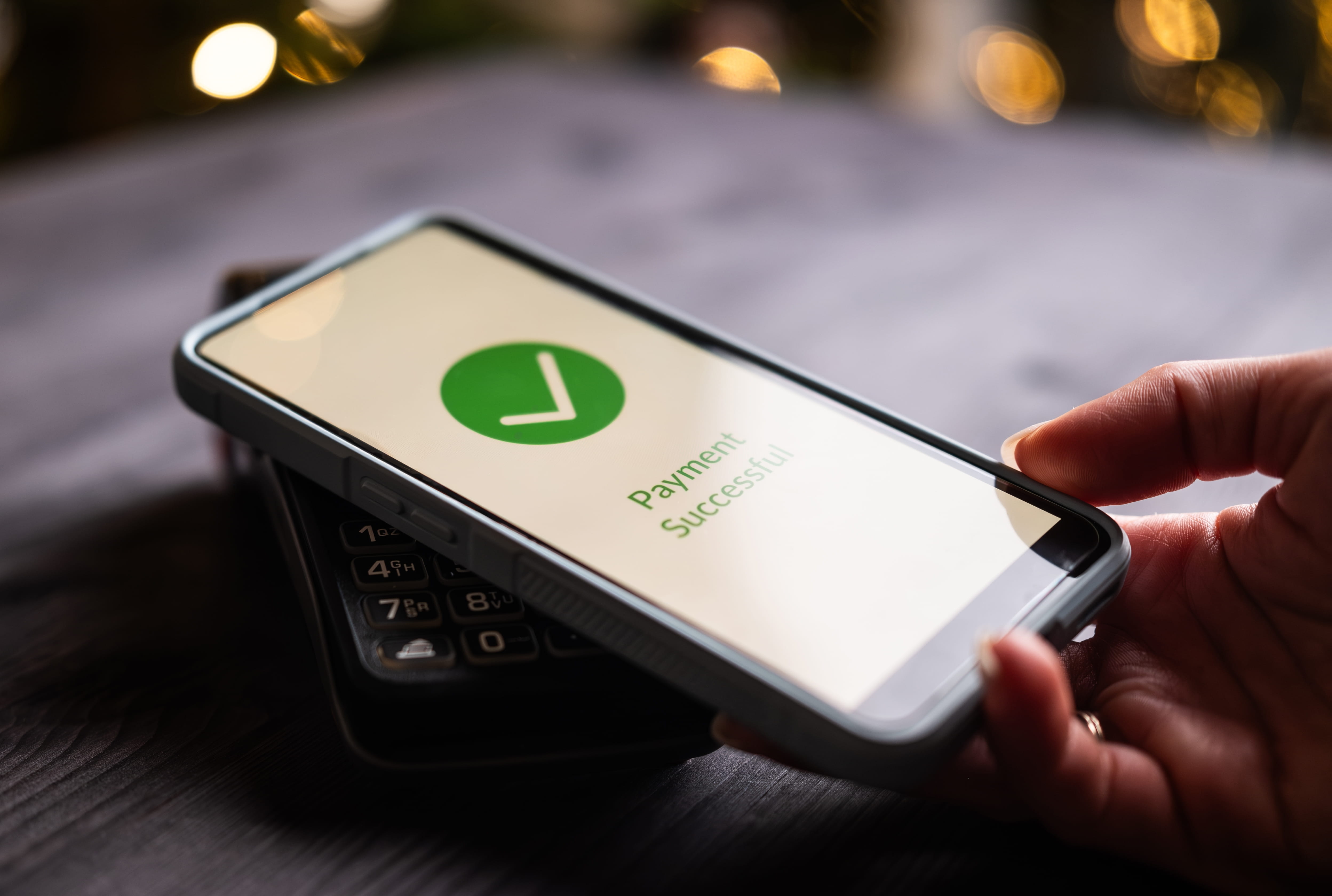 A business team reviewing instant payment activity on a digital platform.